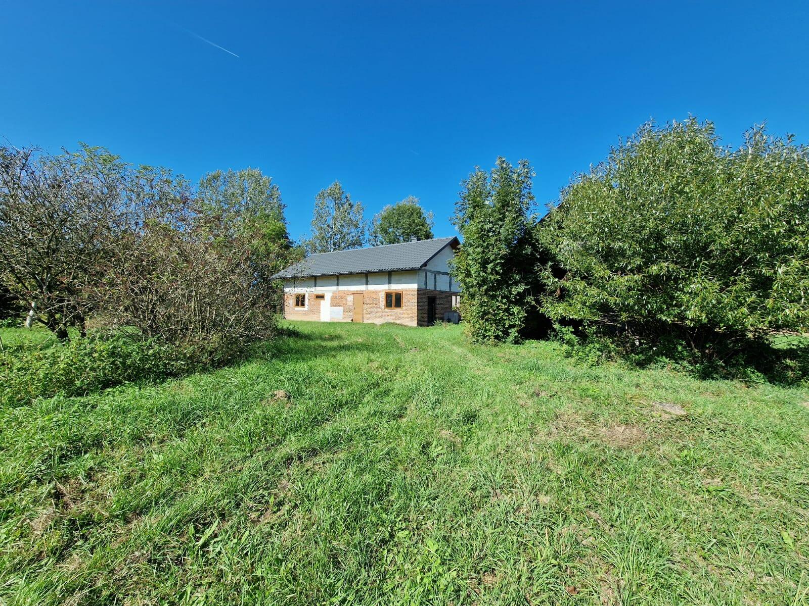 Dom blisko natury działka 23 ary - zdjęcie 1